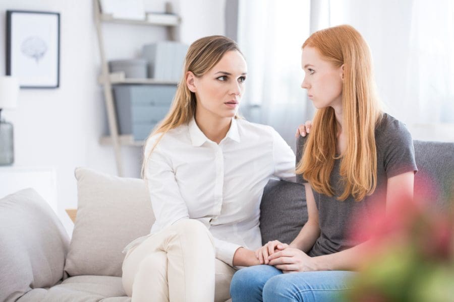 Concerned mom talking with daughter about what to do about self harm
